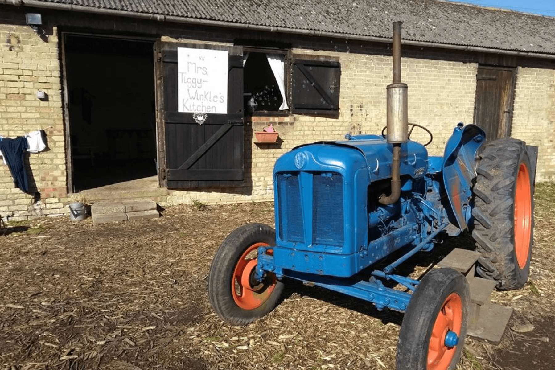 Things to do in East Cambridgeshire -Barn with blue tractor outside