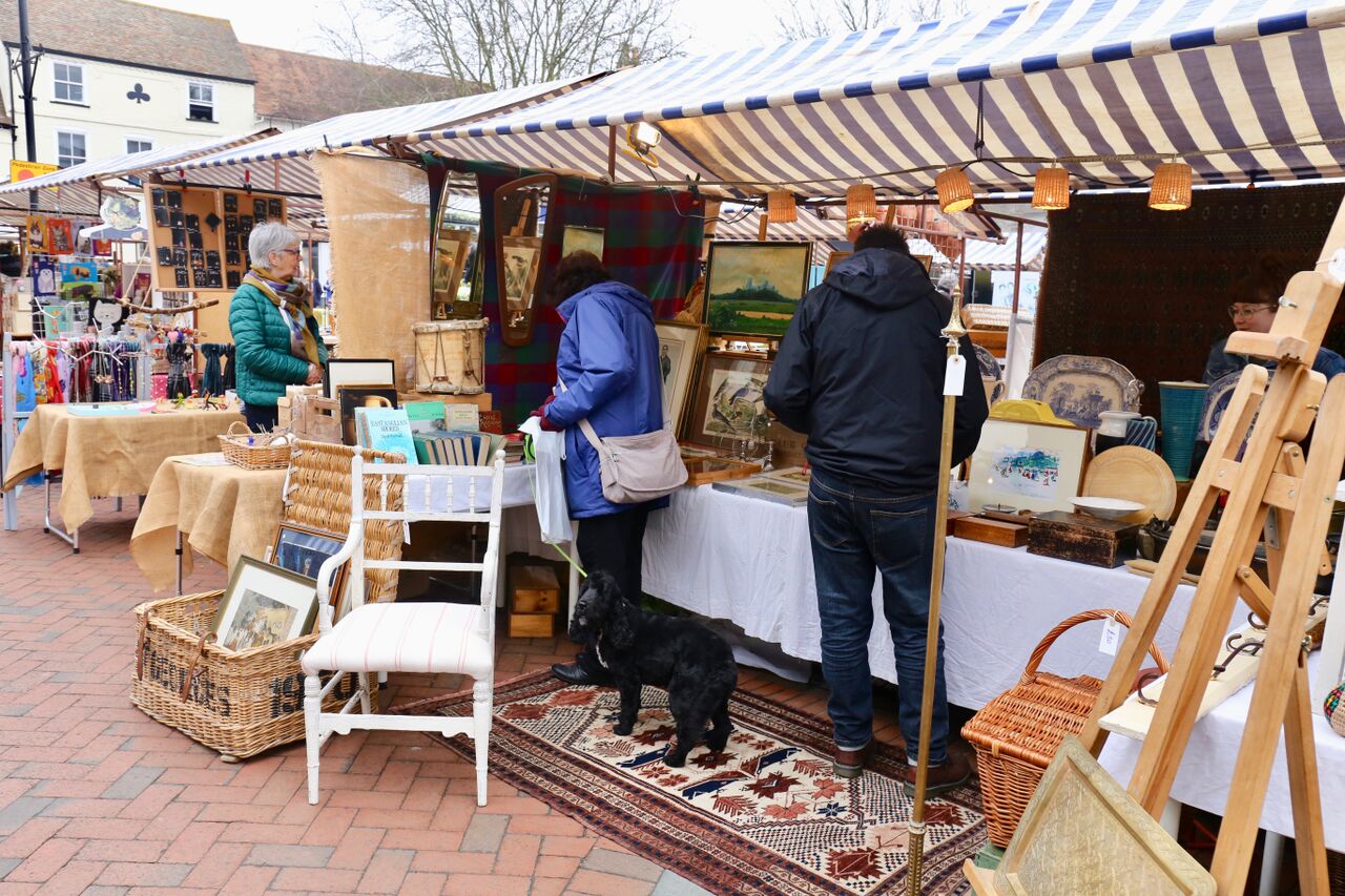 Things to do in East Cambridgeshire - Families. Ely Market. Image of a market stall selling antiques