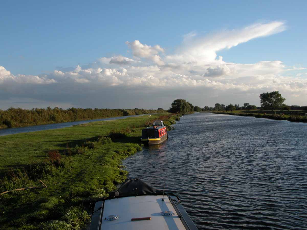 Things to do in East Cambridgeshire - Boating. Image of boats moored on river